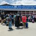 Passengers stranded at Leh airport after cancellation of flights due to rise in temperature on Monday.