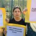 Women protesting against the decision to read down Article 370.