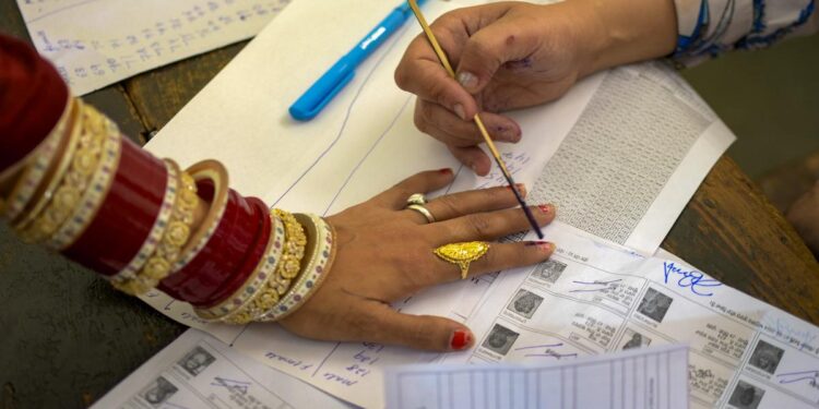 Representational image of a voter getting her finger inked