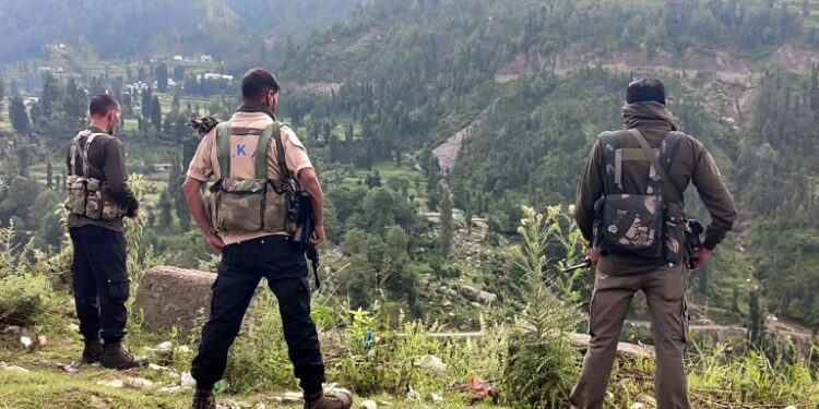 Security personnel during a search operation after a CRPF jawan was killed in a terrorist attack, in Udhampur