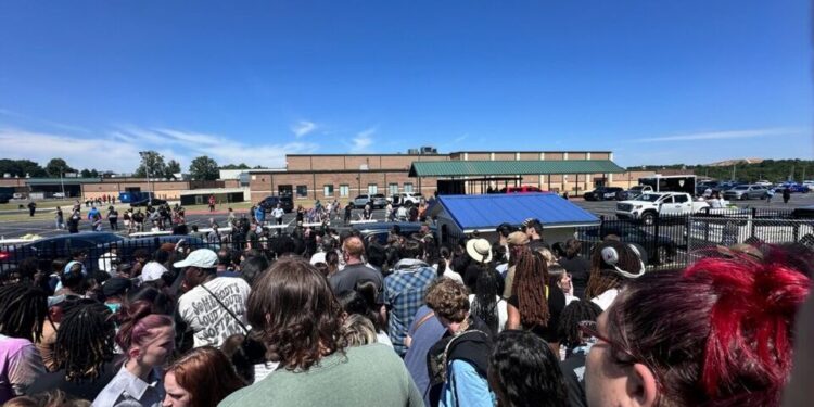 People gathered outside Apalachee high school. Photo: Anthony Lim/Wikimedia commons