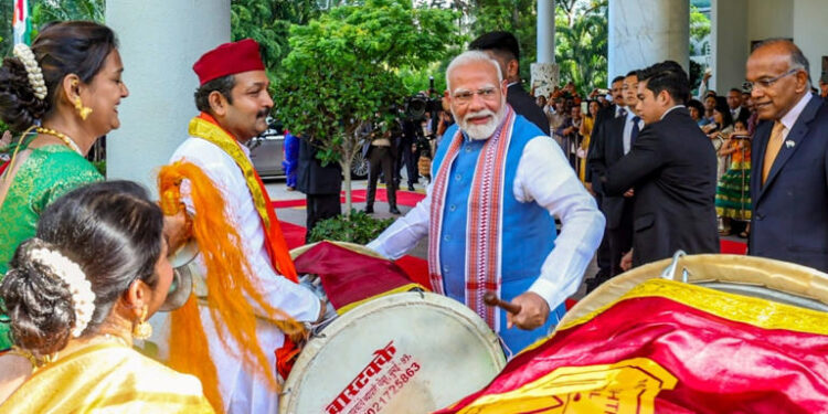 PM Modi gets into the rhythm, plays dhol upon arrival in Singapore