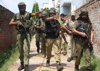 Security personnel at Sunjuwan on outskirts of Jammu City on Monday.