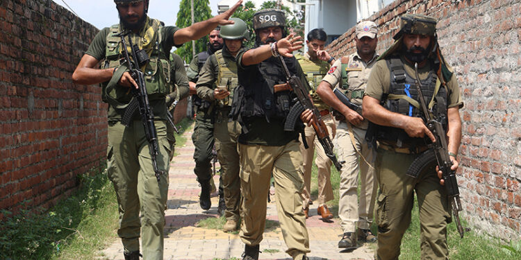 Security personnel at Sunjuwan on outskirts of Jammu City on Monday.