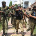 Security personnel at Sunjuwan on outskirts of Jammu City on Monday.