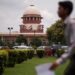 A man walks inside the premises of the Supreme Court in New Delhi.