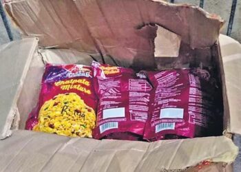 Packets of namkeen filled with cocaine recovered from the Ramesh Nagar godown on Thursday/ (HT PHOTO)