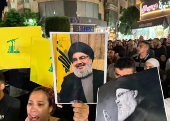 Representative Image: Palestinian protesters carry Hezbollah flags and posters with a picture of Hezbollah leader Sayyed Hassan Nasrallah during a rally in support of Hezbollah, in the West Bank city of Ramallah