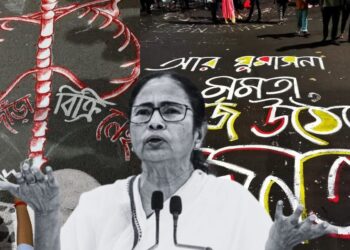 Messages written on the streets say 'can't sell a spine' and 'don't sleep Mamata, the people have risen'. In the foreground is Mamata Banerjee.