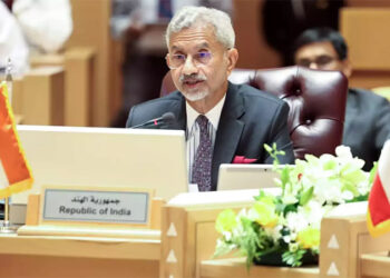 India's Minister for External Affairs Subrahmanyam Jaishankar, second left, walks with a Pakistani official Ilyas Nizami, center, upon his arrival at an airbase in Rawalpindi, Pakistan.