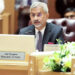 India's Minister for External Affairs Subrahmanyam Jaishankar, second left, walks with a Pakistani official Ilyas Nizami, center, upon his arrival at an airbase in Rawalpindi, Pakistan.