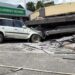 A damaged car trapped underneath a collapsed building in Vanuatu's capital Port Vila after a 7.3-magnitude quake struck on December 17 at a depth of 57 kilometres.