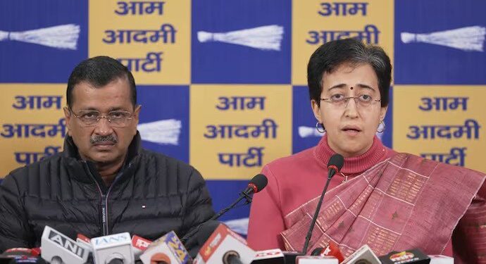 Delhi Chief Minister Atishi (R) and AAP national convener Arvind Kejriwal