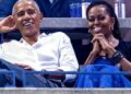 Former US president Barack Obama with wife Michelle Obama.