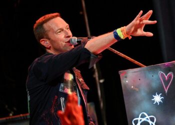 Coldplay's Chris Martin performs during the band's Music Of The Spheres World Tour at the D Y Patil Sports Stadium.