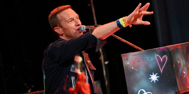 Coldplay's Chris Martin performs during the band's Music Of The Spheres World Tour at the D Y Patil Sports Stadium.