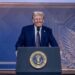 US President Donald Trump is seen on a large screen during his address by video conference at the World Economic Forum (WEF) annual meeting in Davos.(AFP)