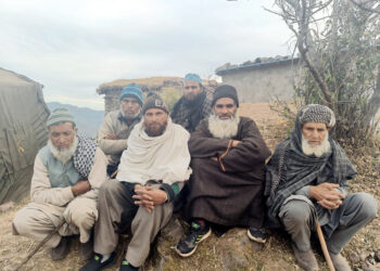 Shocked and scared villagers at Badhaal in Rajouri.