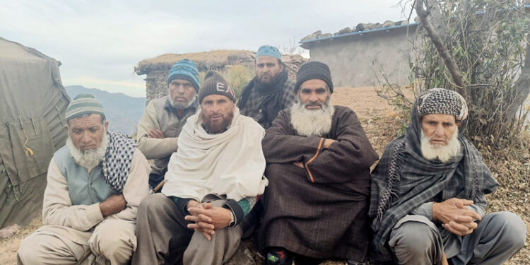 Shocked and scared villagers at Badhaal in Rajouri.